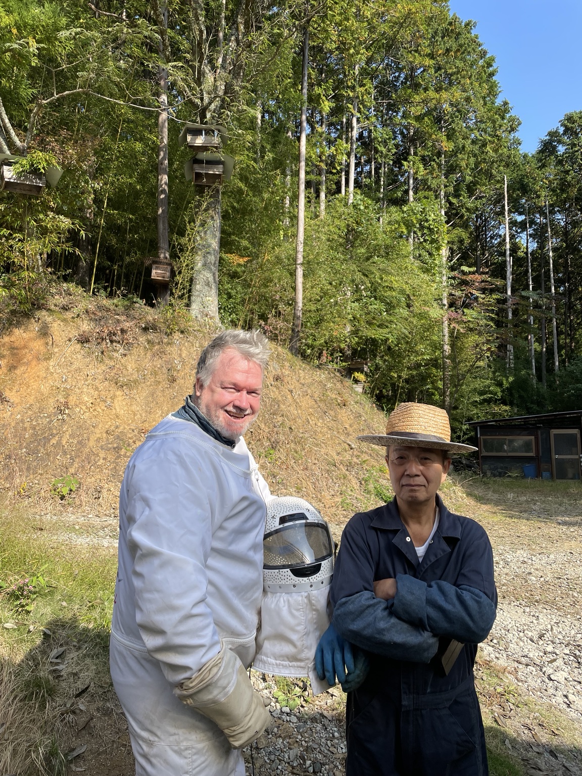 Michael J. Trout and Susumu Tokunaga in the field in Japan